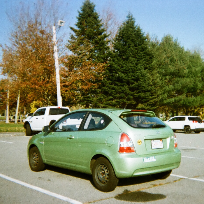 My car, a green hatchback