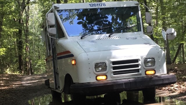 Postal Truck in Town Forest